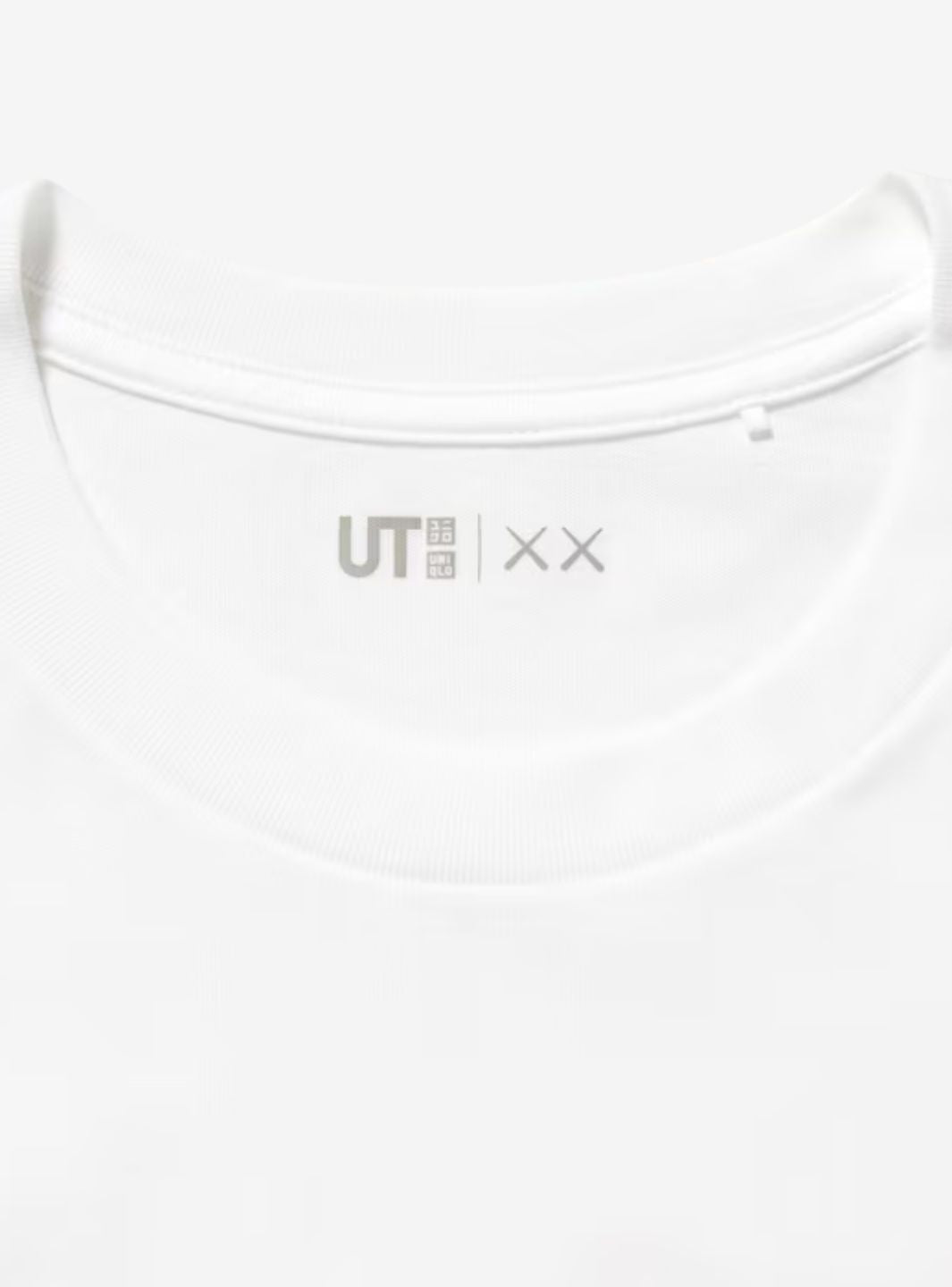 KAWS x Uniqlo UT Short Sleeve Artbook Cover T-Shirt White - 467525 | ResellZone